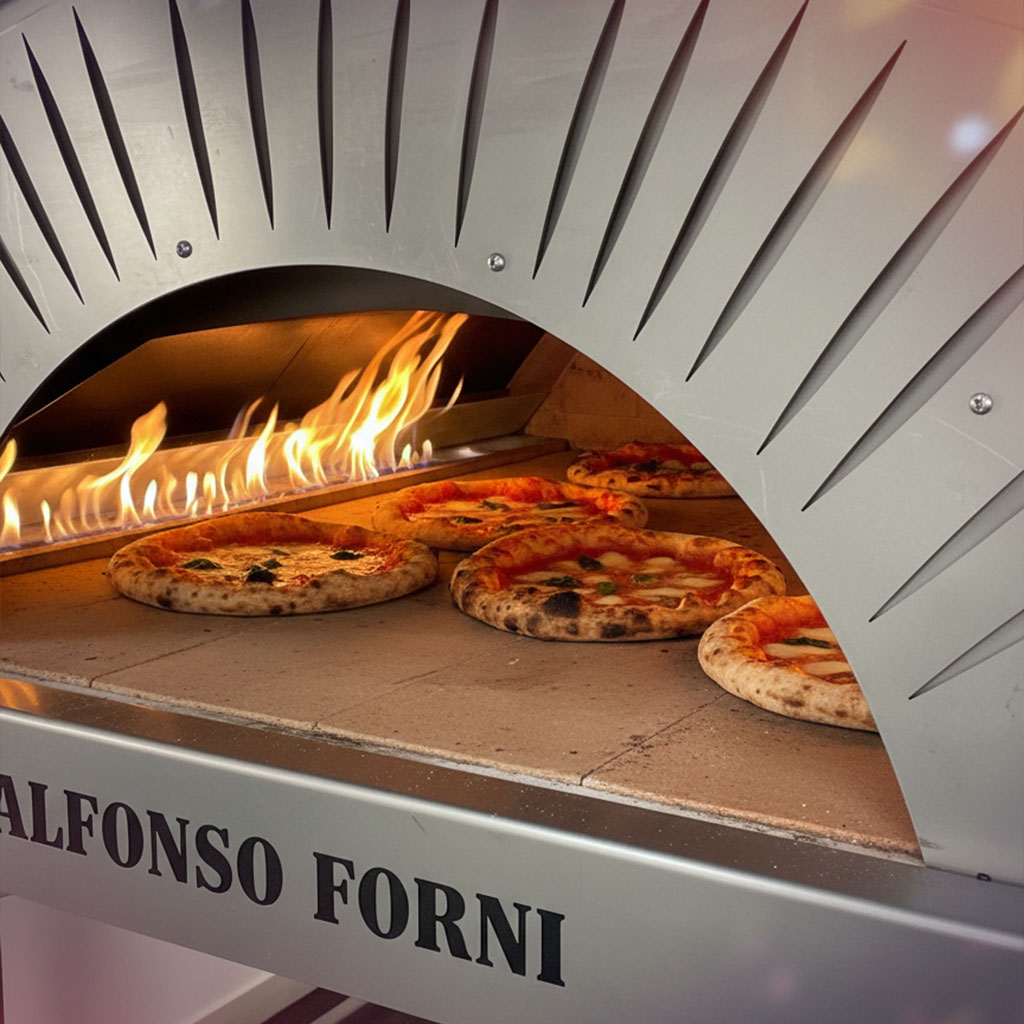 La distribuzione uniforme del calore nel Forno ibrido a legna/gas Alfonso 12 Pizze Professional