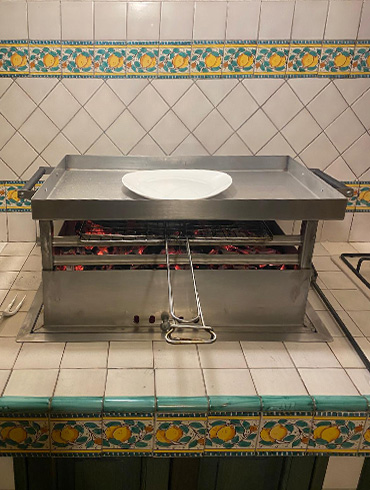 Scaldavivande: sfrutta il calore residuo della brace.jpg